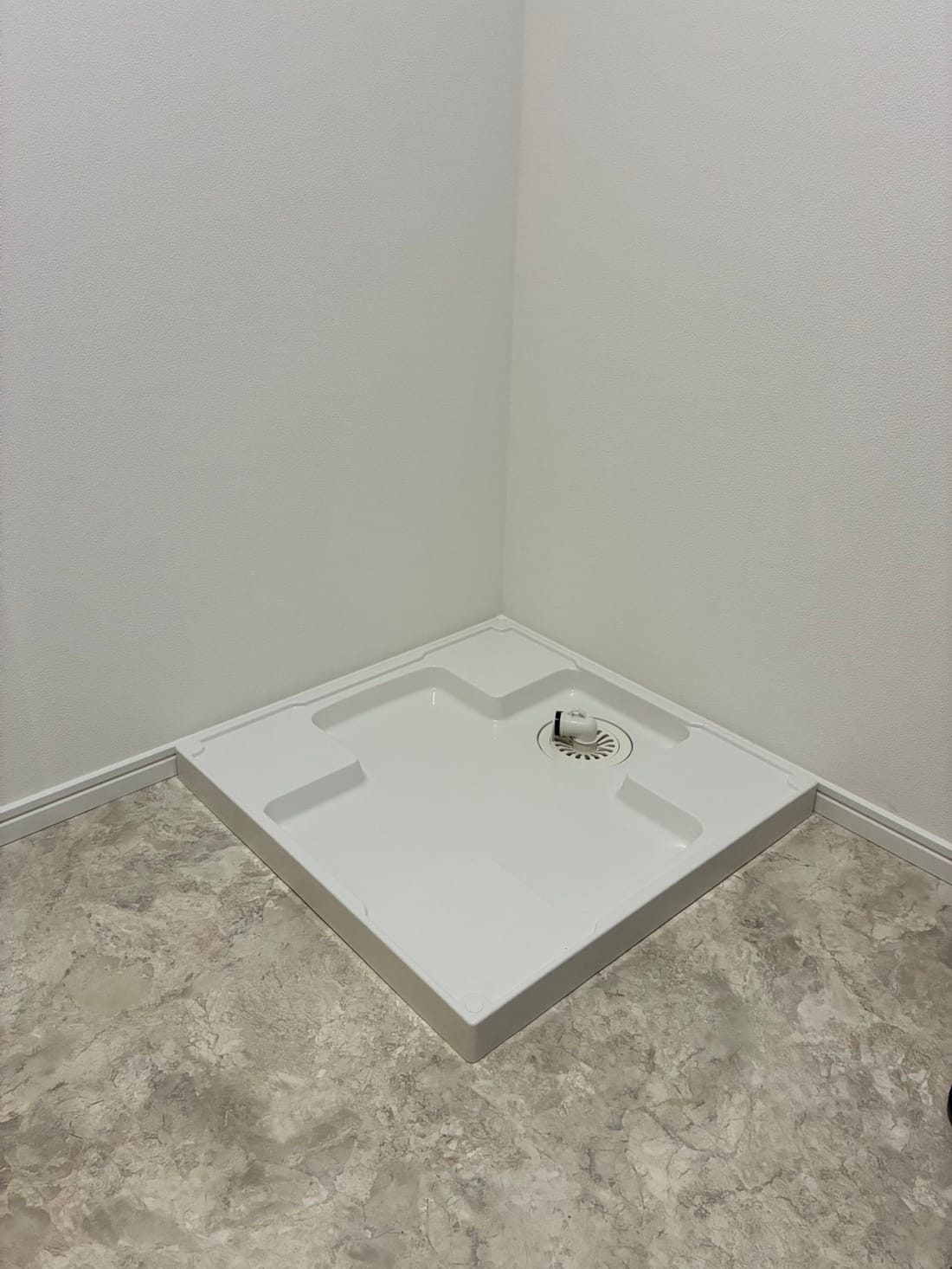 Washing machine pan after installation